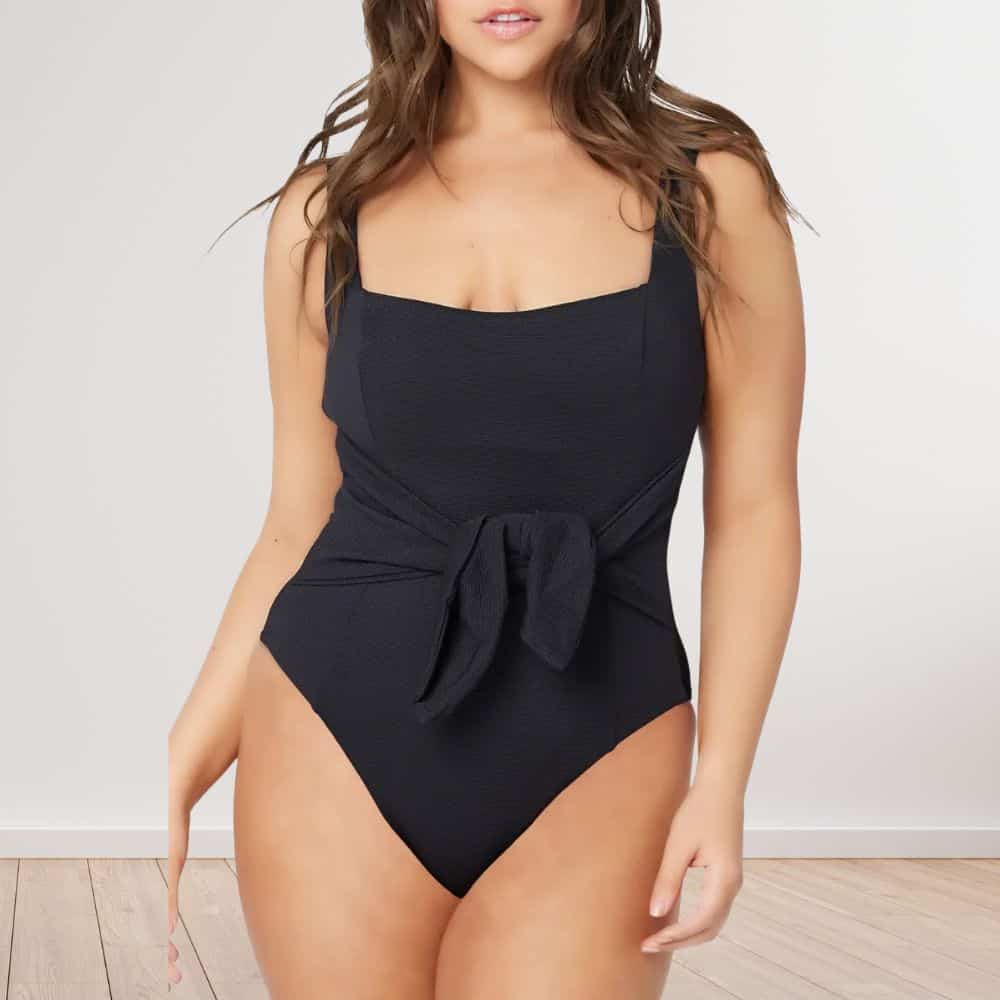 One-piece suit with waist detailing